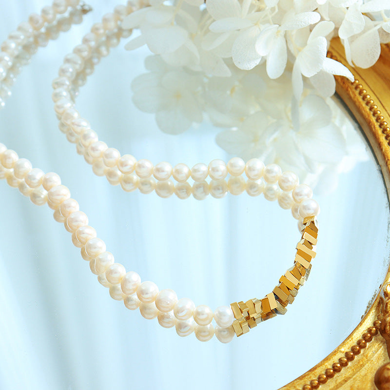 Pearl Necklace with Triangle Gold Plated Stitching